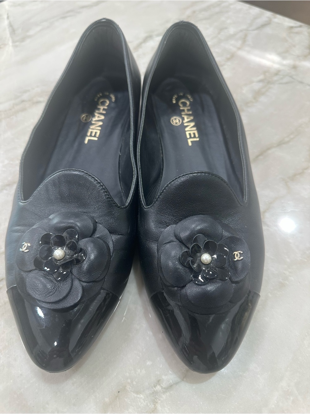 CHANEL Black Leather Camellia Pointed-Toe Flats with Pearl Detail